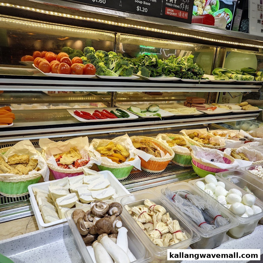 A vibrant display of fresh vegetables, fried items, and various ingredients for a customizable meal.