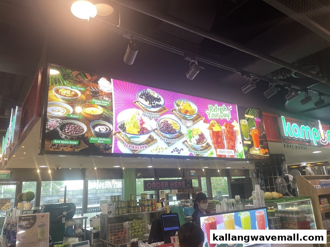 A brightly lit menu board showcasing a variety of traditional Asian desserts and refreshing drinks.