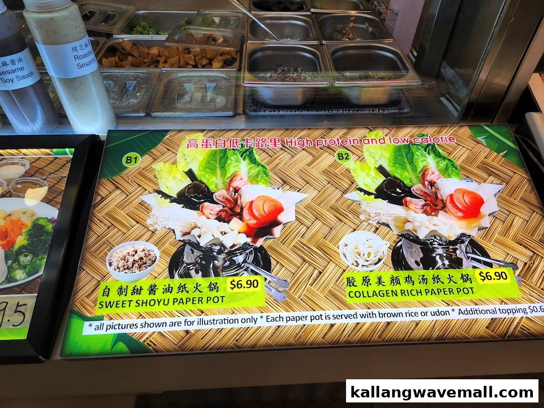 A vibrant menu board displaying two 'High Protein and Low Calorie' paper pot dishes with prices and serving options.