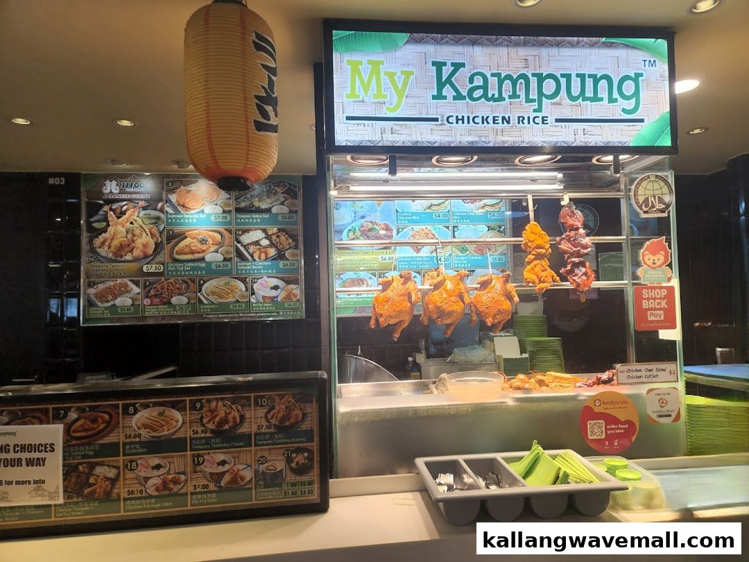 The My Kampung Chicken Rice stall front, featuring roasted chickens on display and menu boards.