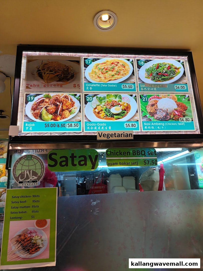 A vibrant menu board displaying various Malay and Indonesian dishes with prices and images.