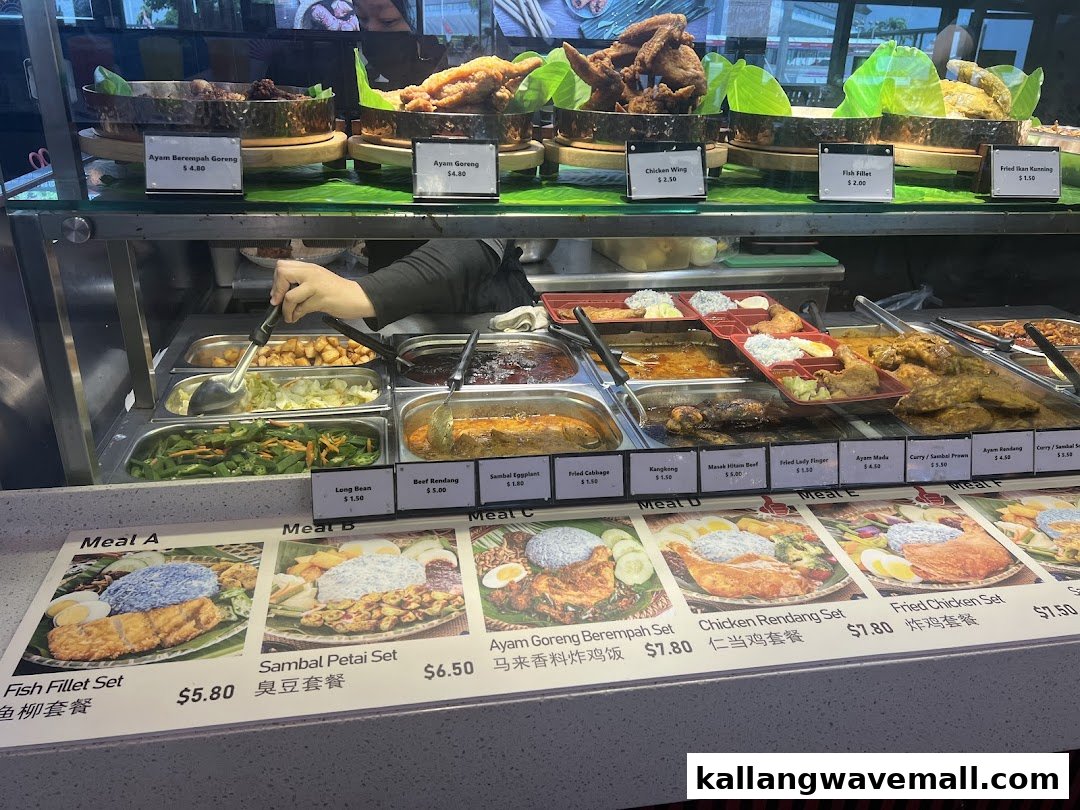 A vibrant display of traditional Malaysian dishes and set meals at My Kampung food stall.