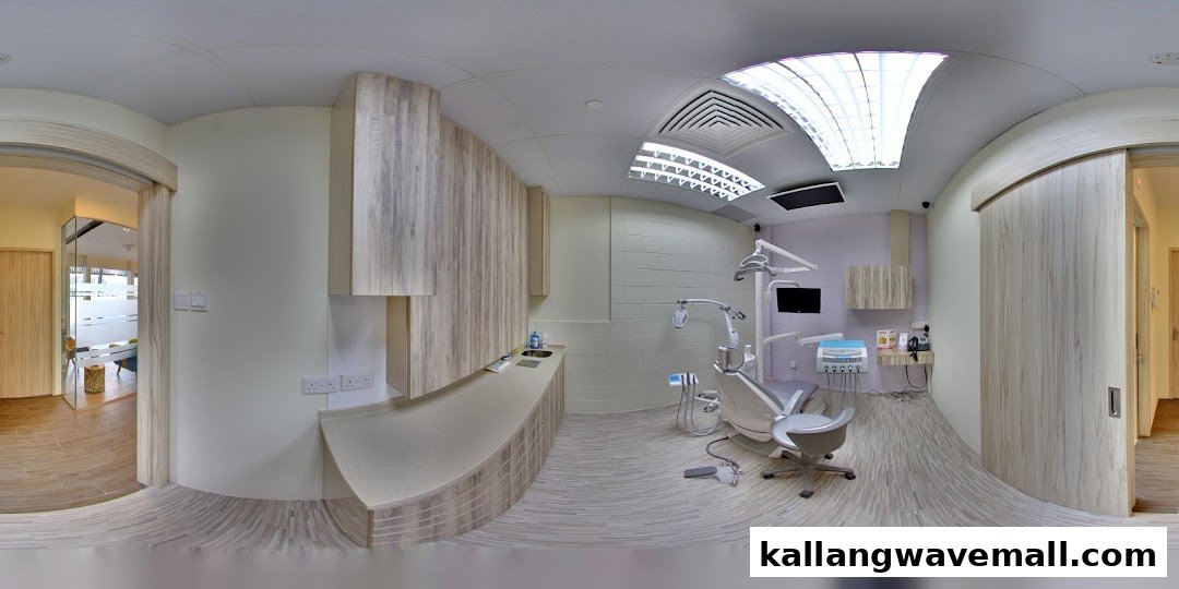A modern and well-equipped dental treatment room with a dental chair and professional equipment.