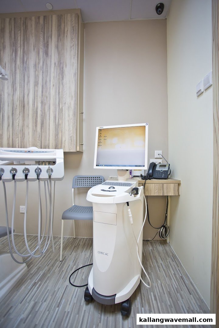 Interior view of Newport Dental, showing modern dental equipment and a CEREC AC machine.