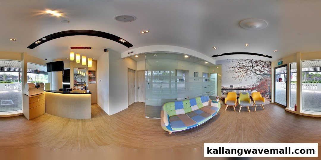 A panoramic view of Newport Dental's modern and inviting reception and waiting area.