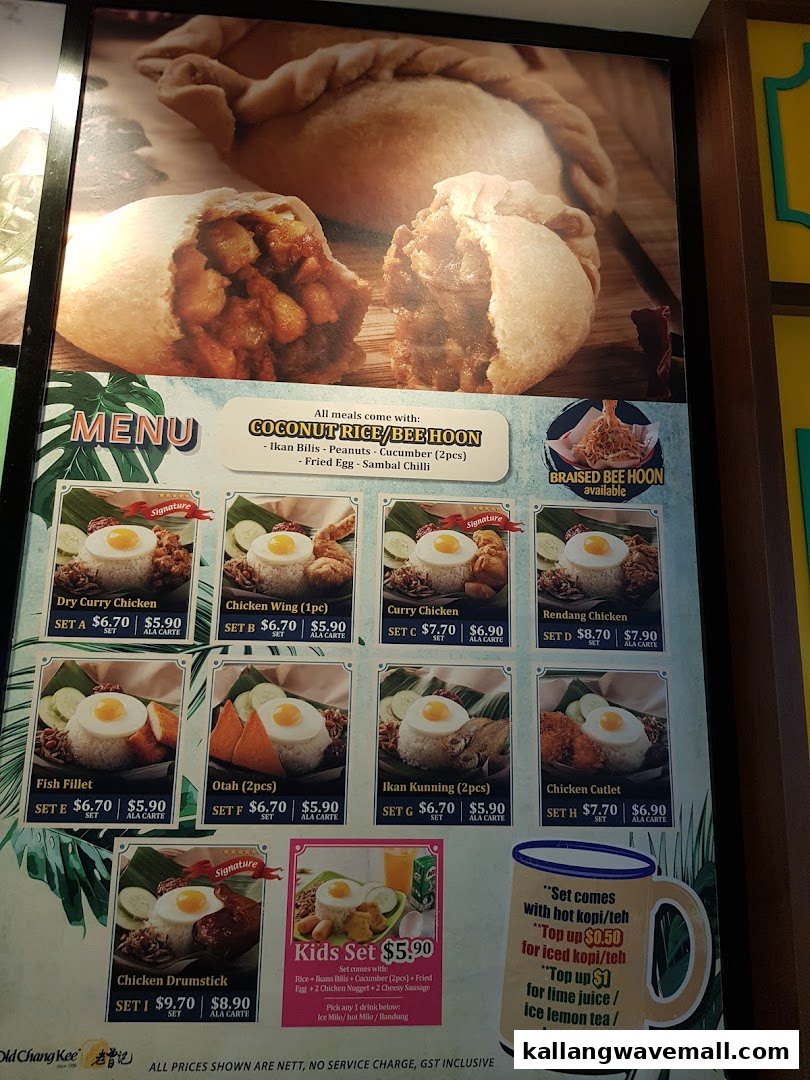 A detailed menu board displaying various Nasi Lemak sets and curry puffs from Old Chang Kee.