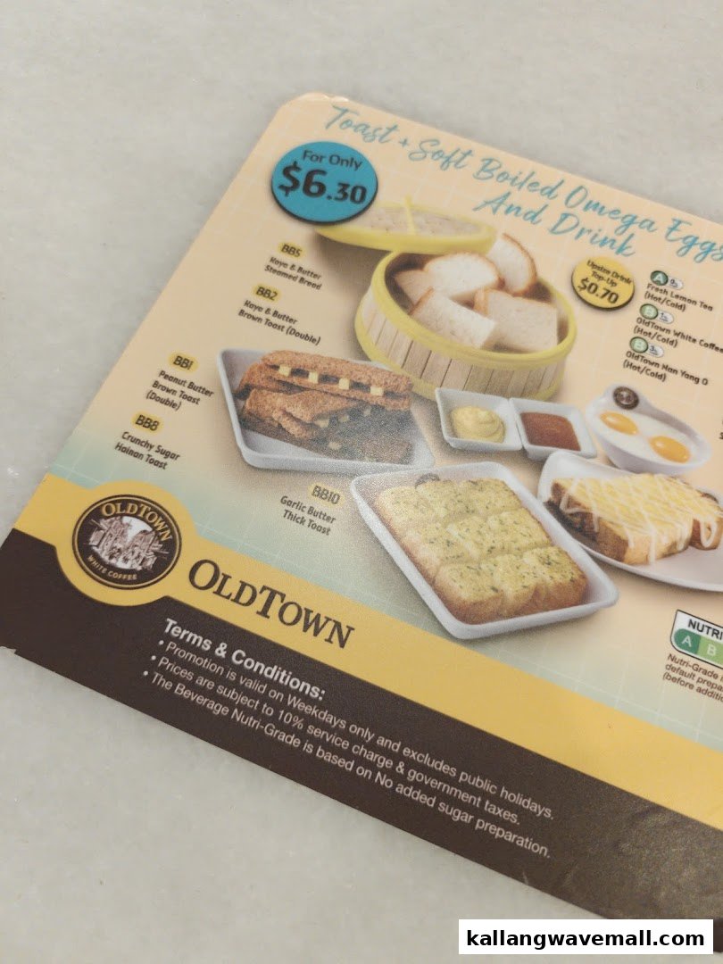 A close-up of a menu card from Oldtown White Coffee, showcasing toast and drink combos.