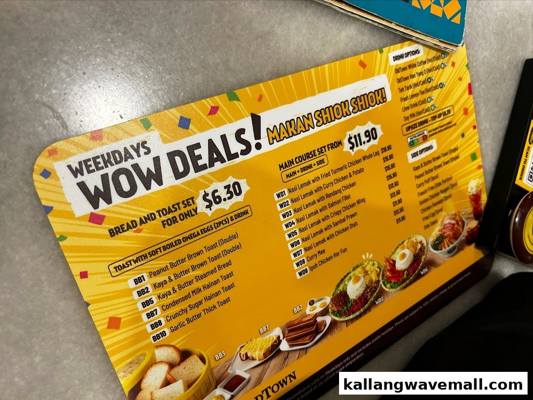 A close-up view of Oldtown White Coffee's 'Weekdays Wow Deals' menu, featuring breakfast and main course sets.