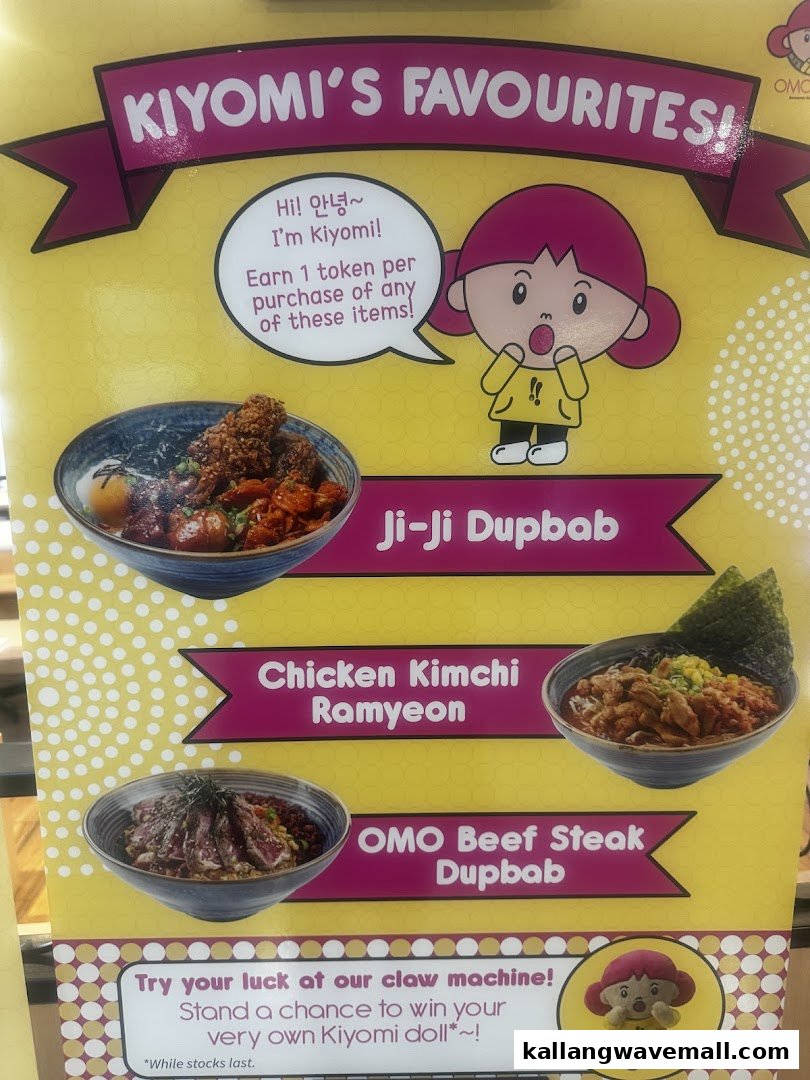 A vibrant menu board showcasing OMOOMO's 'Kiyomi's Favourites' dishes and a claw machine promotion.