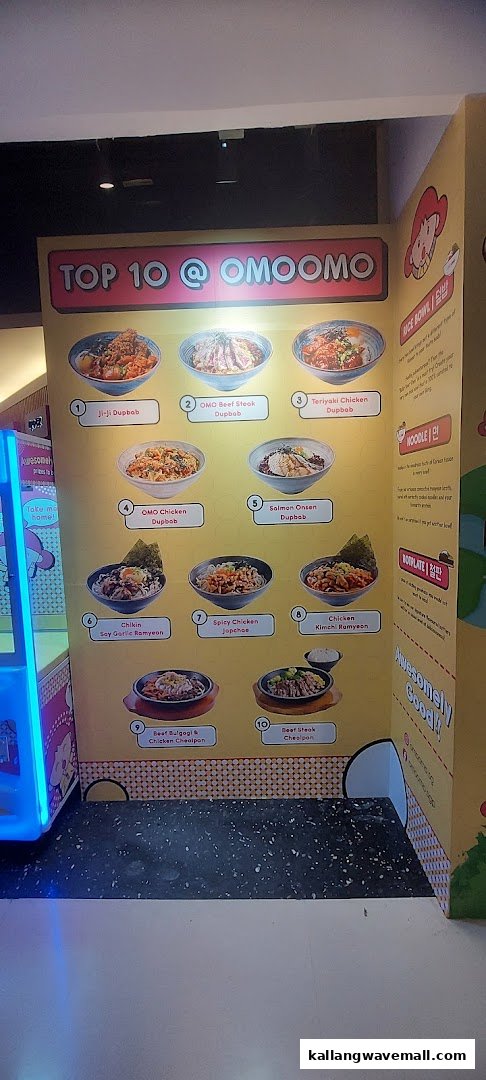 A vibrant display board showcasing OMOOMO's 'Top 10' popular Korean-inspired rice bowls, noodles, and hotplate dishes.