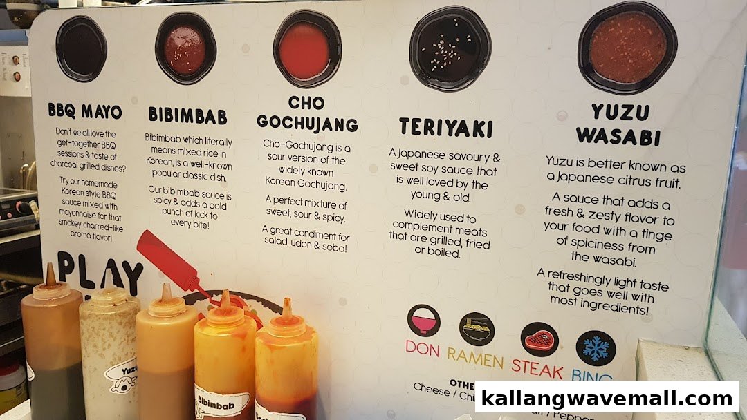 A display board showcasing various sauces and condiments with their descriptions and corresponding bottles.