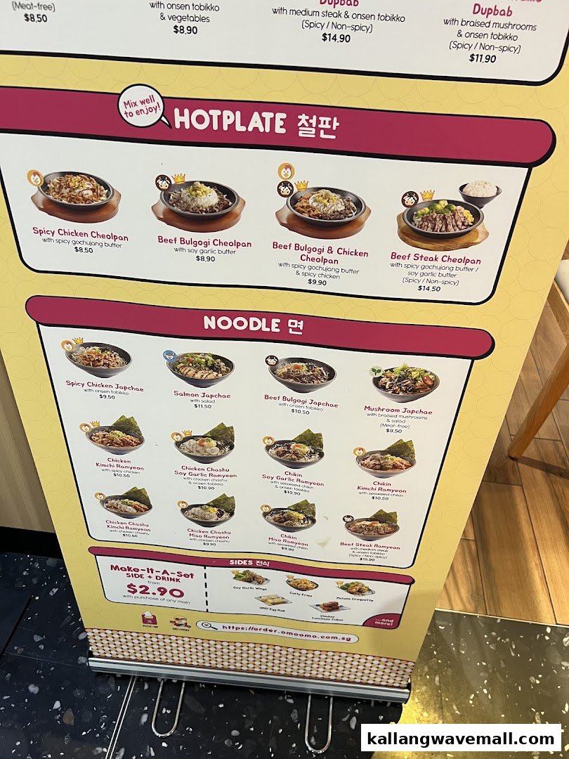 A vibrant menu board displaying Korean hotplate, noodle, and side dishes with prices.