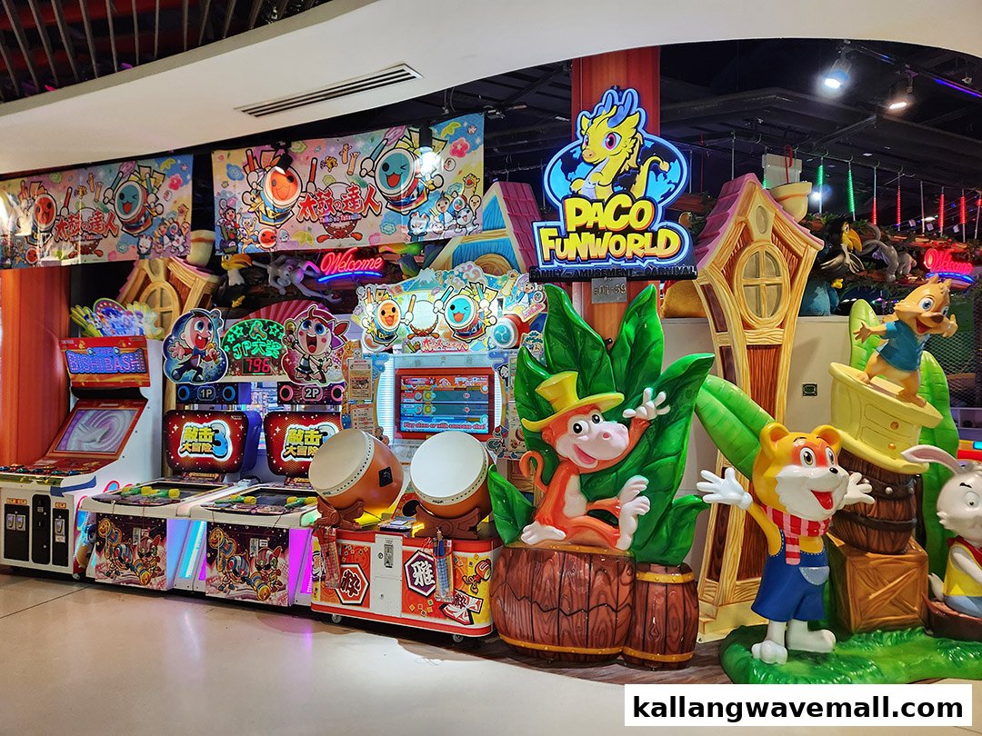 A vibrant arcade interior featuring various amusement games, colorful decorations, and cartoon character statues.