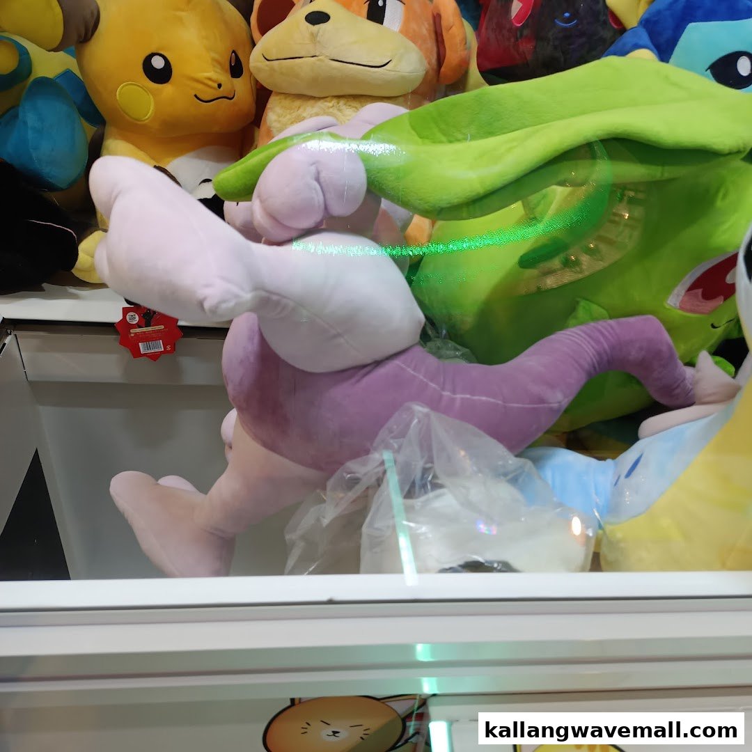 A vibrant collection of plush toys, including popular characters, displayed inside an arcade game machine.