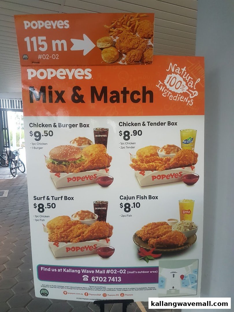 A Popeyes menu board showcasing 'Mix & Match' meal boxes with prices and ingredients.