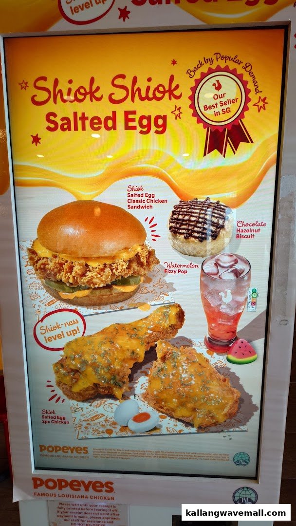 A promotional display board showcasing Popeyes' popular "Shiok Shiok Salted Egg" menu items.