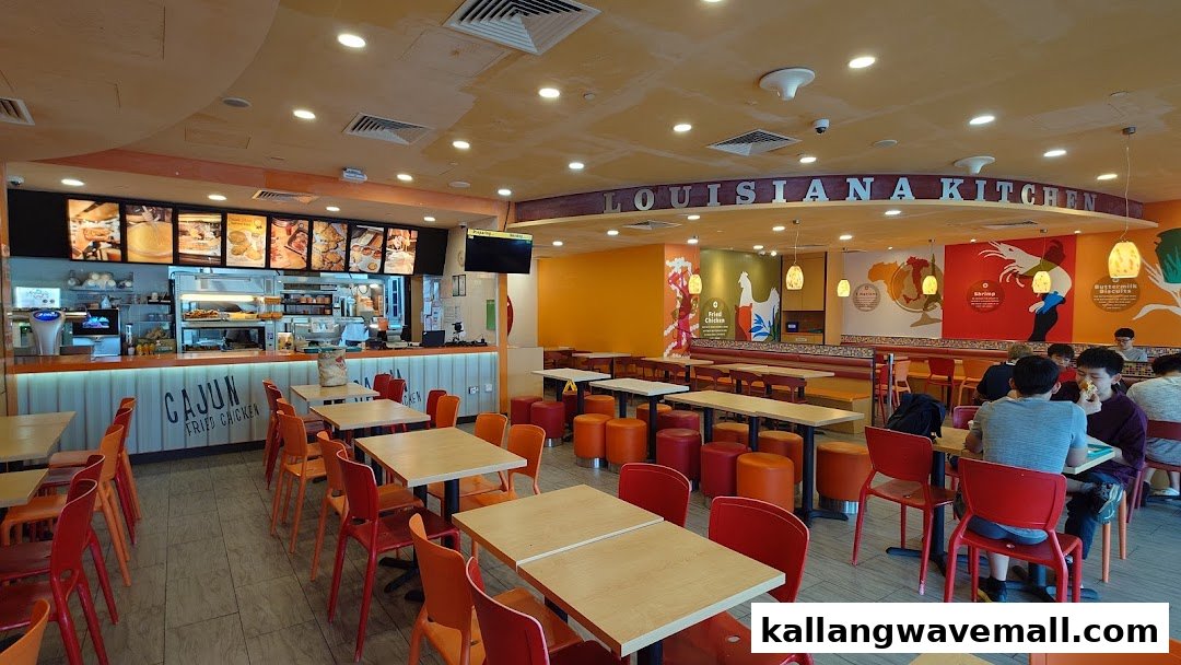 Vibrant interior of Popeyes with counter service, ample seating, and customers enjoying meals.