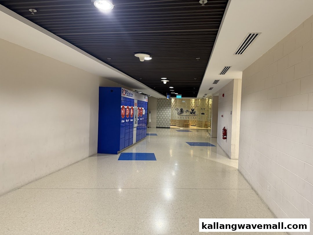 A blue POPStation locker system in a brightly lit mall corridor.