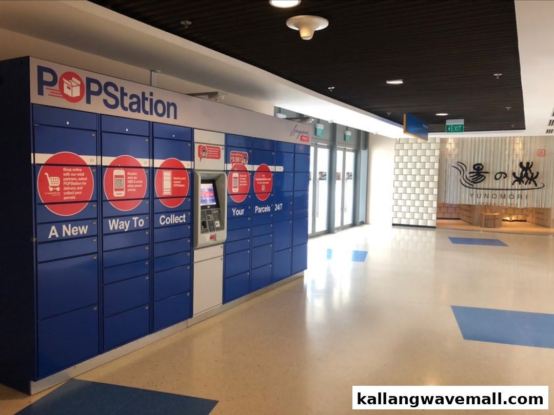 A Popstation parcel locker system with blue lockers and an interactive kiosk for 24/7 parcel collection.
