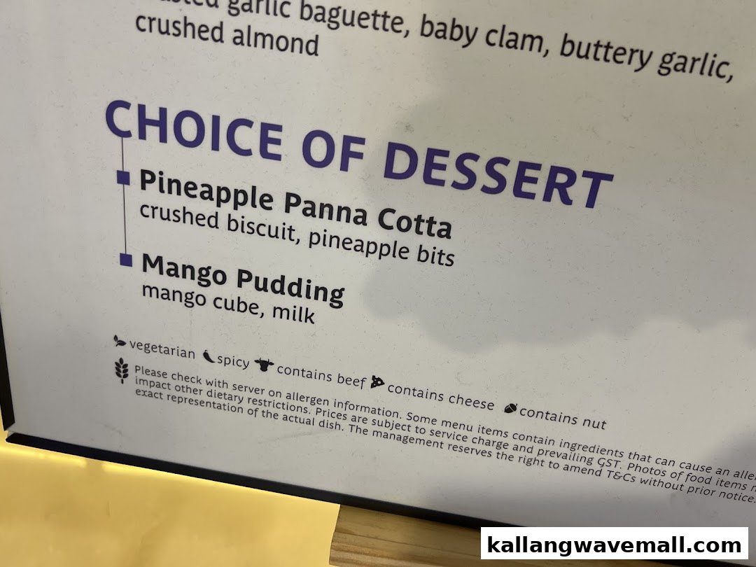 A close-up of a menu board displaying dessert options and allergen information.