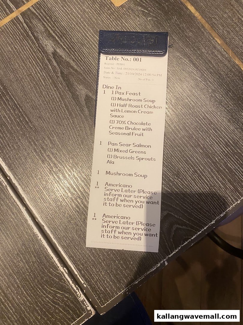 An order slip from Poulet showing various food and beverage items for a dine-in order.