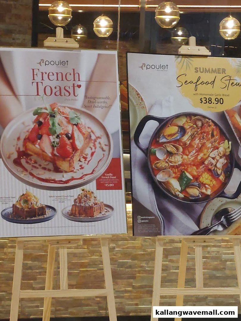 Two promotional posters for Poulet, showcasing French Toast variations and a Summer Seafood Stew.