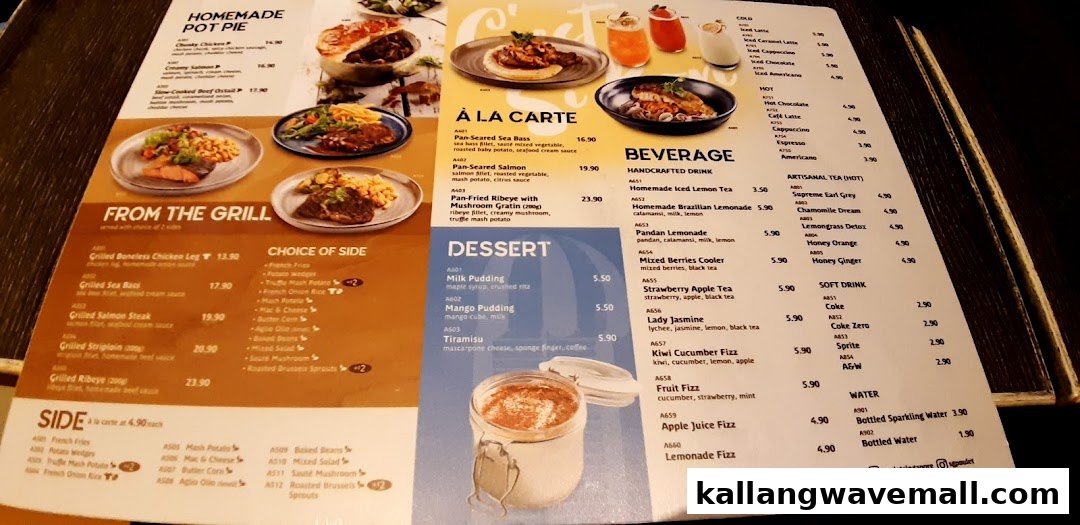 A detailed view of Poulet's menu, showcasing main courses, desserts, and beverages.