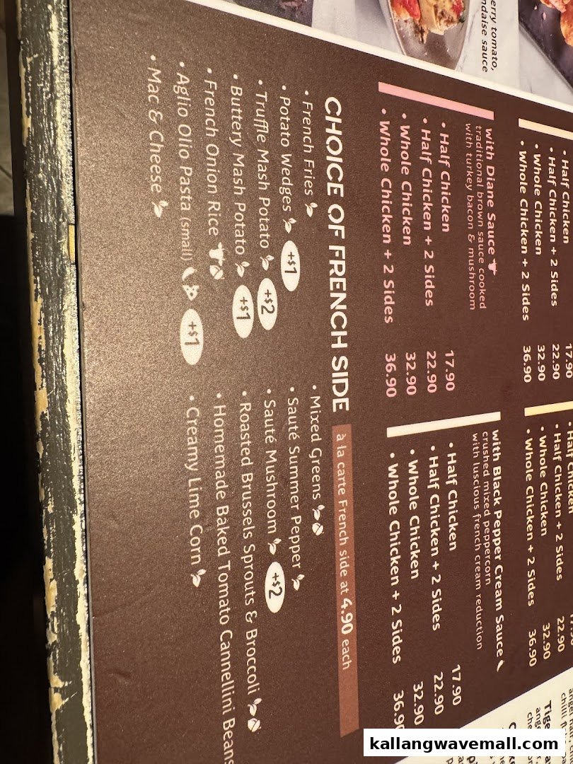 A detailed menu displaying Poulet's signature chicken dishes with various sauces and a selection of French sides.