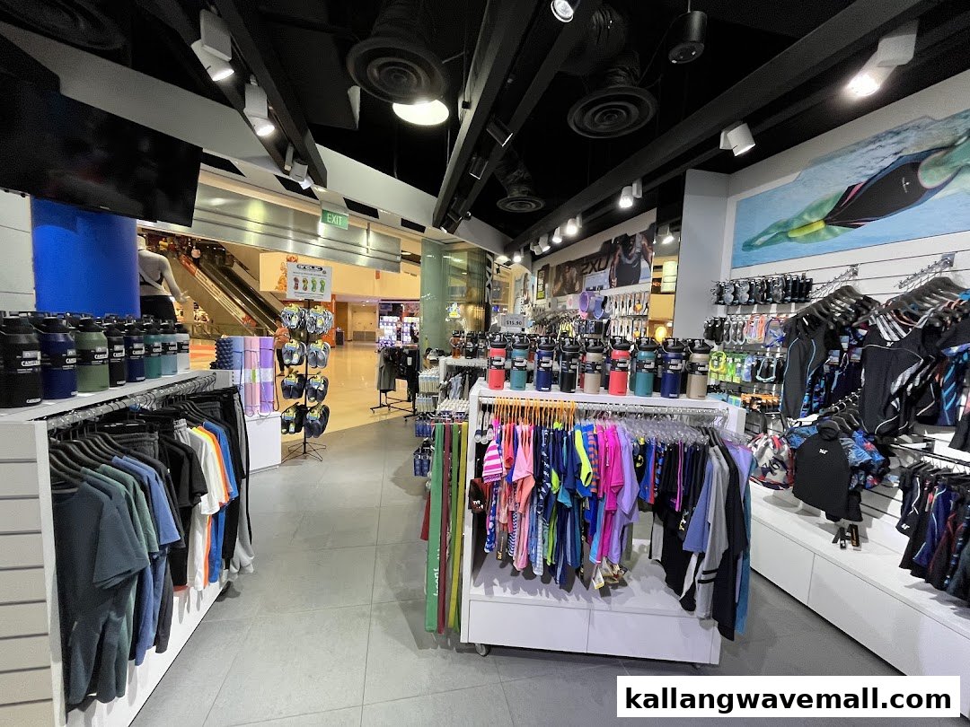 Interior view of Power Up Express, showcasing athletic apparel, swimwear, and water bottles.