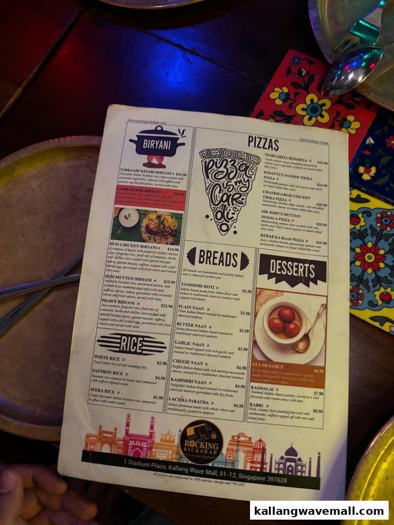 A detailed menu from Rocking Rickshaw, showcasing a variety of Indian dishes.