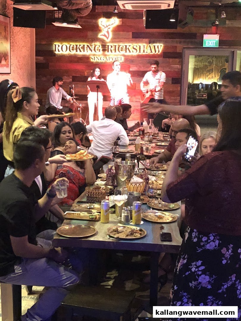 Diners enjoy a lively evening with live music at Rocking Rickshaw.