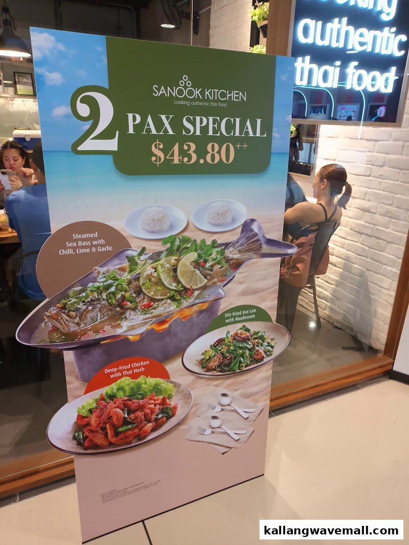 A promotional standee for Sanook Kitchen's 2 Pax Special featuring authentic Thai dishes.