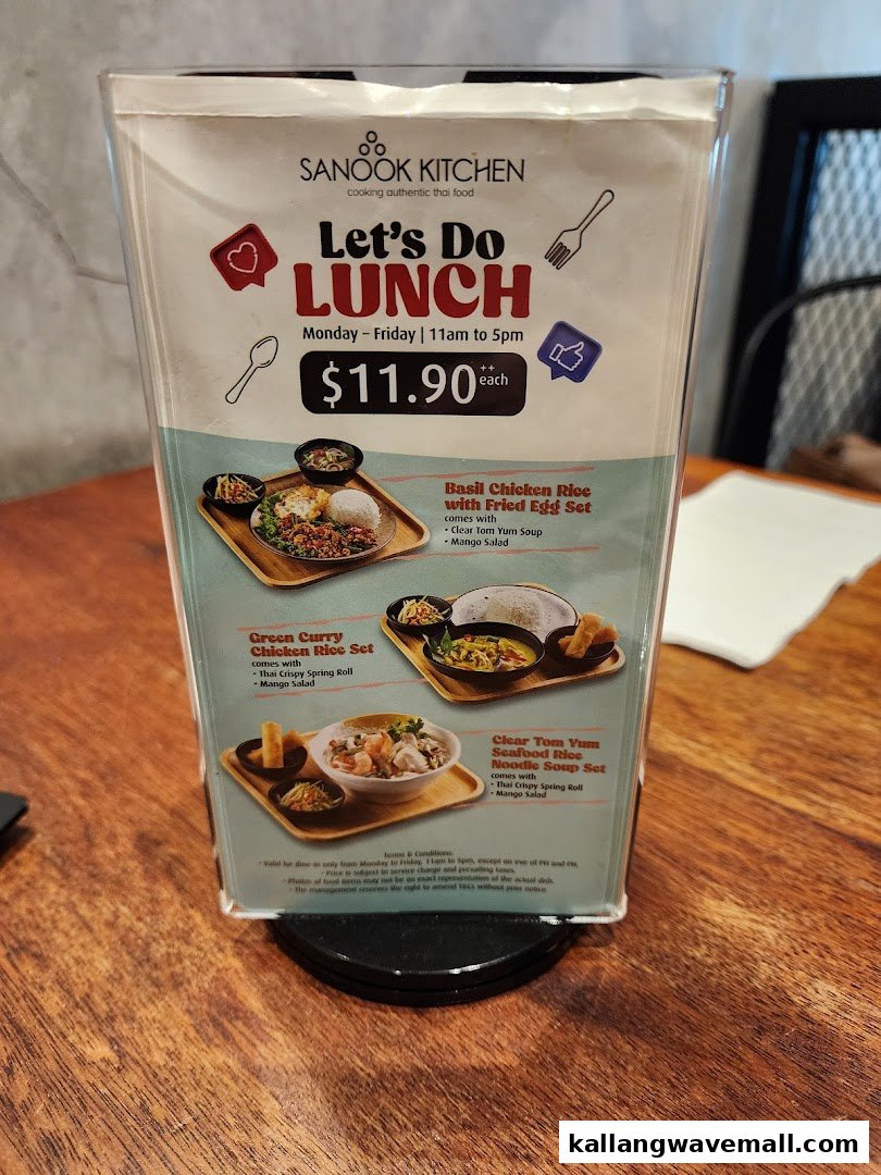 A table-top menu displaying Sanook Kitchen's authentic Thai lunch specials and prices.