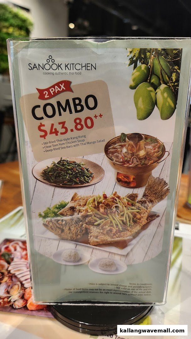 A menu stand displaying Sanook Kitchen's 2-pax combo featuring Thai dishes and pricing.