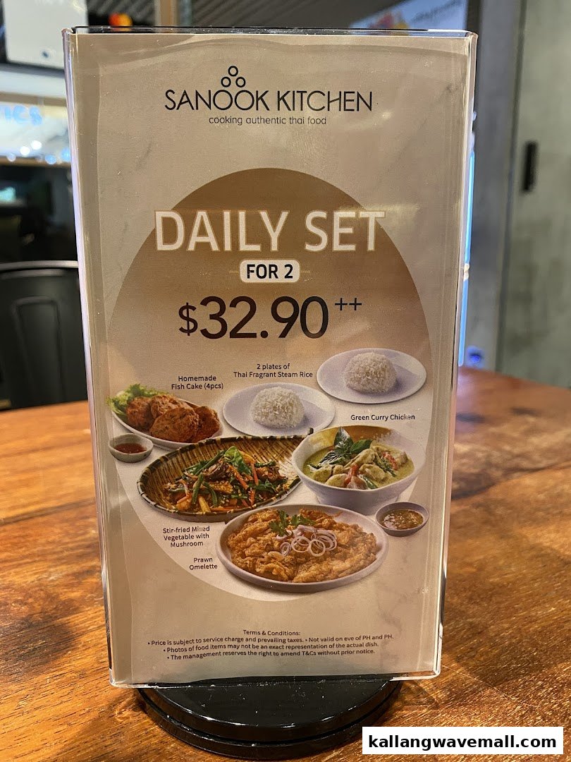 A table-top menu displaying Sanook Kitchen's 'Daily Set for 2' with various Thai dishes.