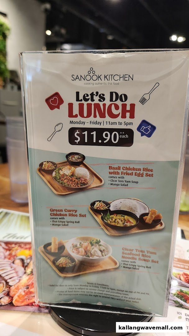 A table-top menu displaying Sanook Kitchen's special lunch sets and pricing.