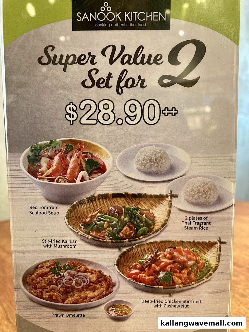 A menu board displaying Sanook Kitchen's 'Super Value Set for 2' with various Thai dishes.