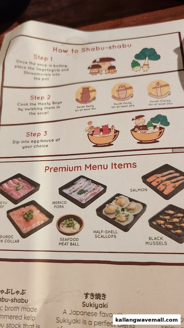 A Suki-Ya menu displaying shabu-shabu cooking instructions and premium ingredient options.