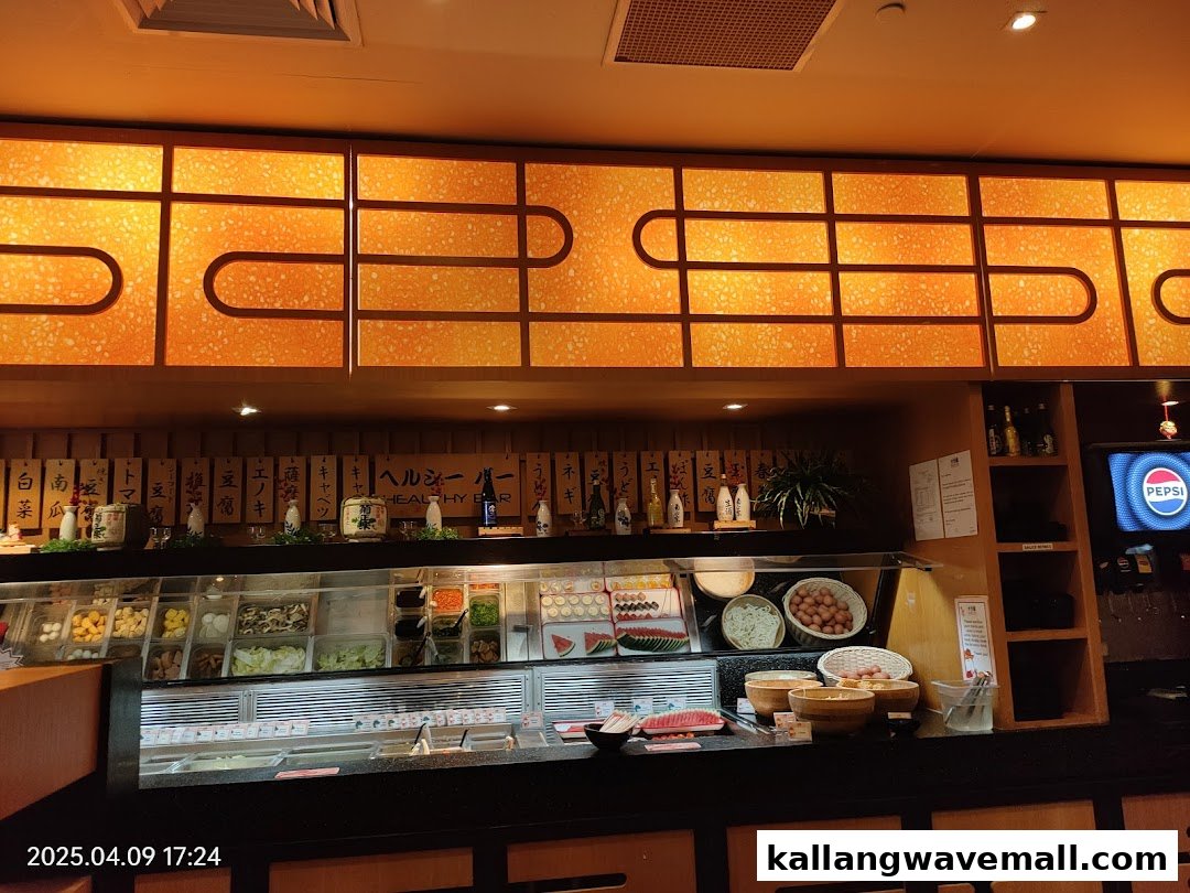 A vibrant self-service healthy bar inside Suki-Ya, featuring fresh shabu-shabu ingredients.