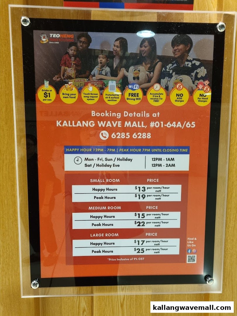 A display board showing KTV room rates, booking details, and features for Teo Heng KTV Studio.
