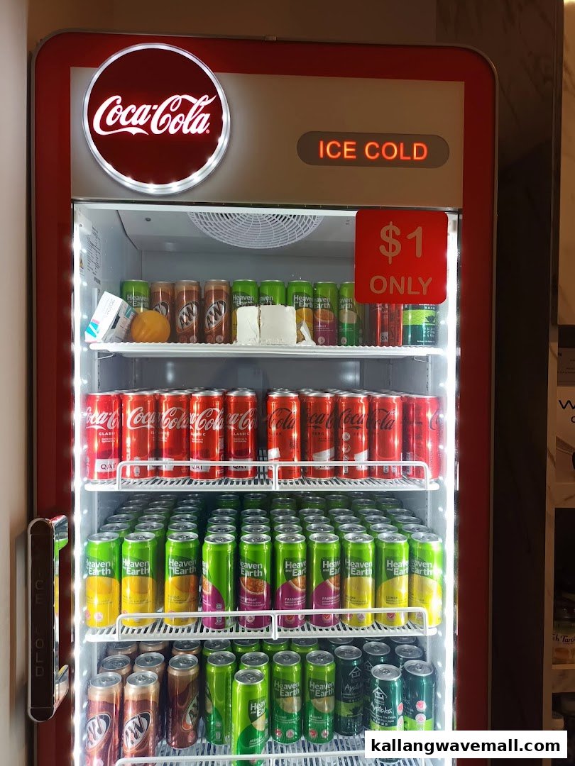 A Coca-Cola branded refrigerator stocked with various ice-cold canned drinks, priced at $1 each.