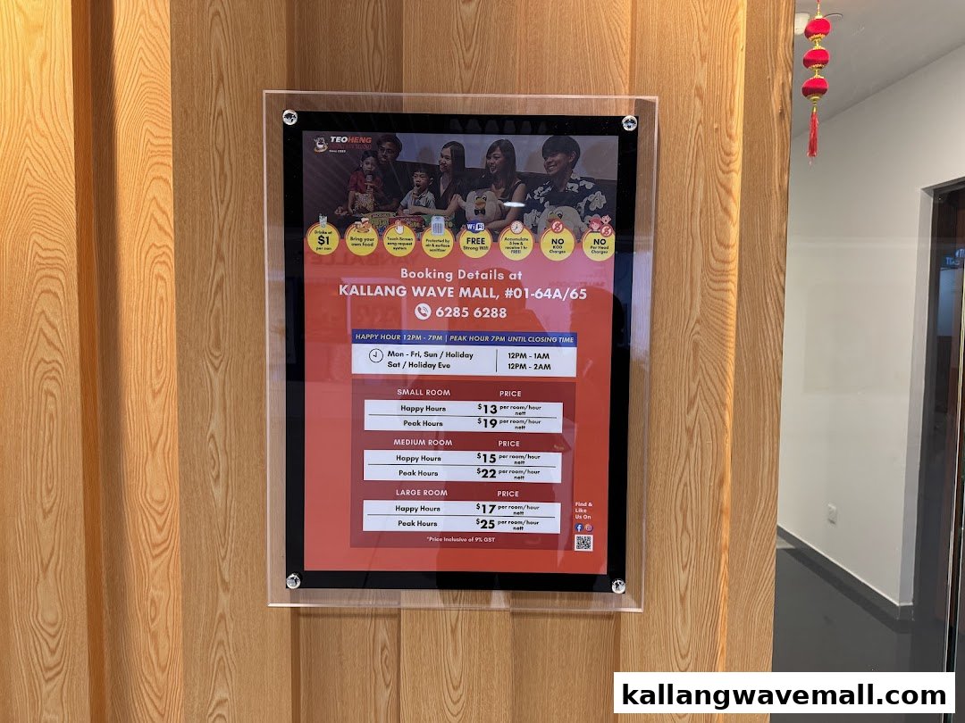 A display board showing KTV room rates, booking details, and special features.