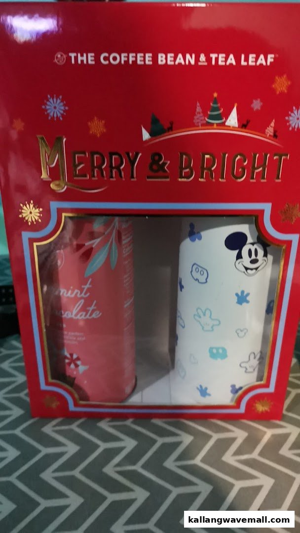 A festive 'Merry & Bright' gift set from The Coffee Bean & Tea Leaf, featuring peppermint chocolate and a Mickey Mouse mug.