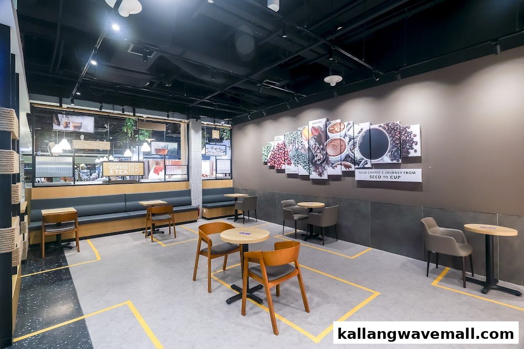 Spacious and inviting interior of The Coffee Bean & Tea Leaf, featuring comfortable seating and coffee-themed wall art.