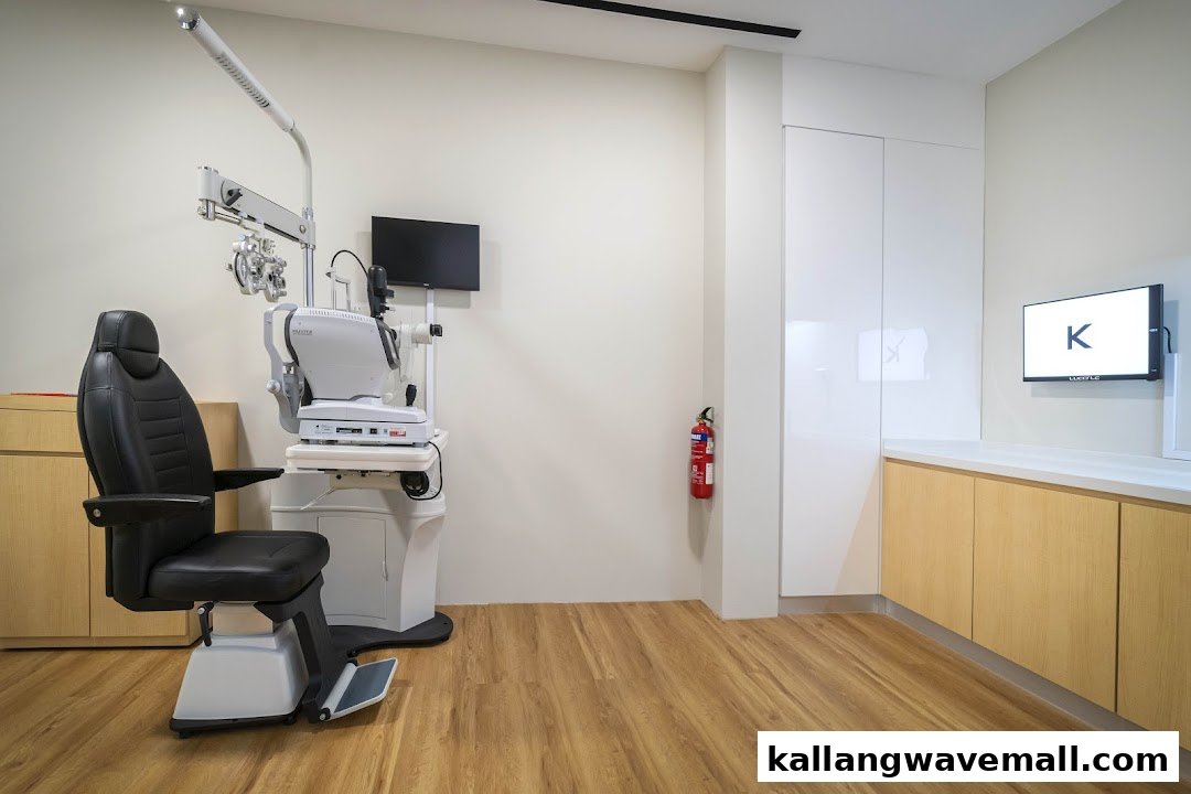 An eye examination room featuring a patient chair and advanced optical diagnostic equipment.