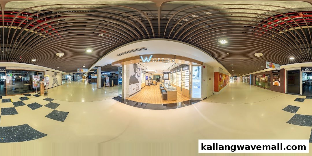 The well-lit storefront of W Optics, an eyewear shop, showcasing its modern interior within a shopping mall corridor.