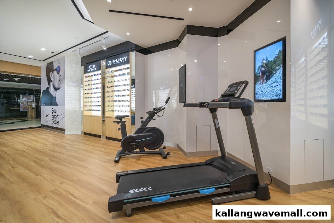 Interior of W Optics, featuring eyewear displays, a Nike Sport Vision poster, and fitness equipment.