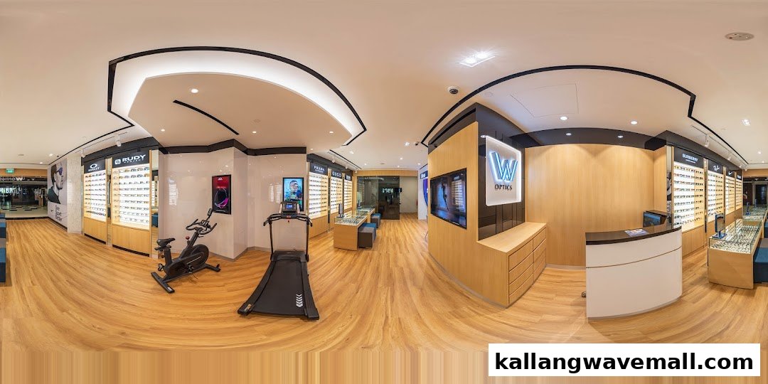 Interior view of W Optics, showcasing eyewear displays, a reception desk, and fitness equipment for sports vision testing.