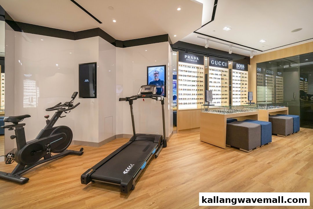 Interior of W Optics featuring premium eyewear displays from brands like Prada and Gucci, alongside fitness equipment.