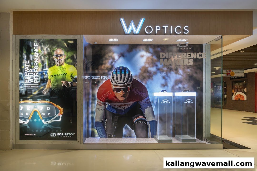 The W Optics shop front features sports eyewear displays with large athletic imagery and brand logos.